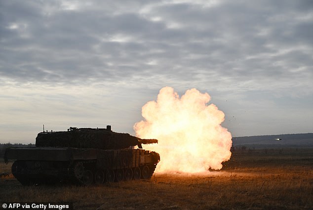 Tankers of the 33rd independent mechanized brigade of the Ukrainian Ground Forces fire with the Leopard 2A4 tank during field training in Ukraine