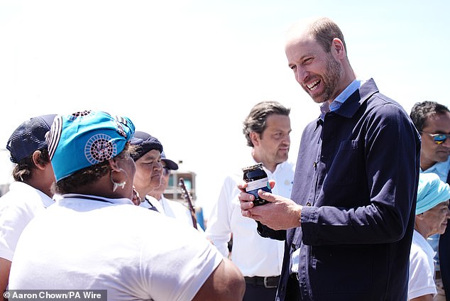 The Prince of Wales beamed as he accepted a jar of sour fig jam from fishermen and women at Kalk Bay Harbor in Cape Town this morning.