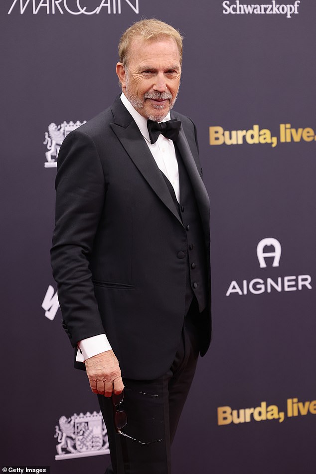 Costner stepped out for a round of red carpet photos dressed in a traditional three-piece black tuxedo and matching bow tie.