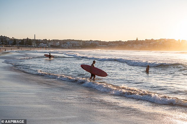 Harbor City is forecast to hit a high of 26C over the weekend amid forecasts of possible rain, while Brisbane could receive up to 5mm of rain on Saturday (pictured, Bondi Beach).