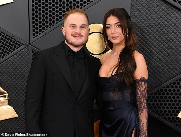 Bryan and LaPaglia pose on the red carpet at the Grammys in February of this year