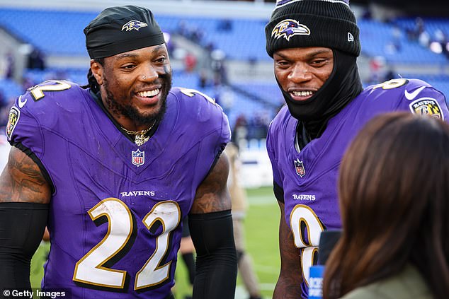 Henry's moment overshadowed Lamar Jackson's (right) brilliance during the game