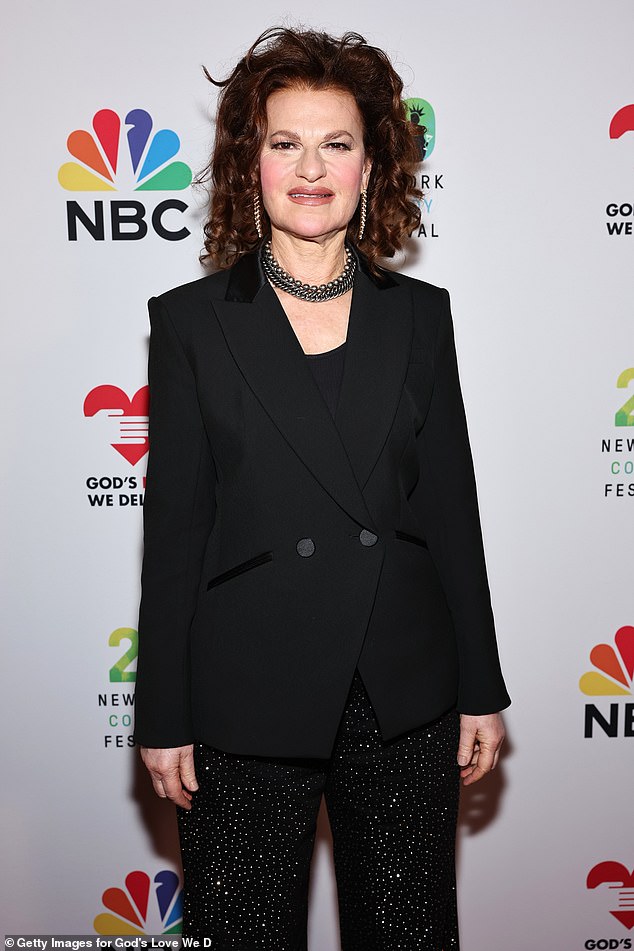 Sandra Bernhard paired her muted black jacket and blouse with a set of sequin pants, recapturing a vibe from the '80s when she first became a comic book star.