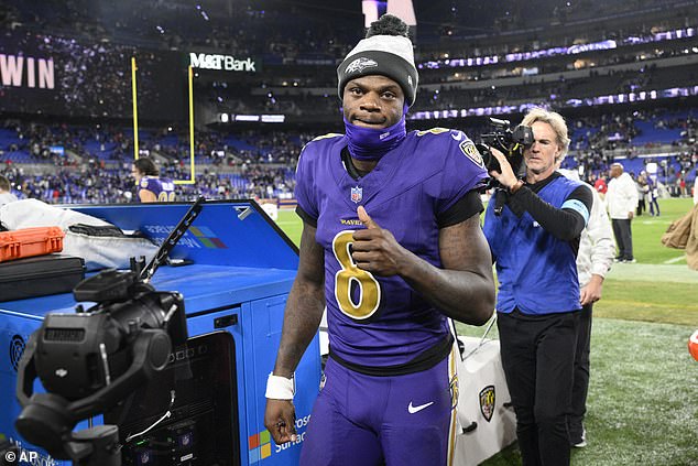 The quarterback was serenaded with 'MVP' chants after his four-touchdown performance.