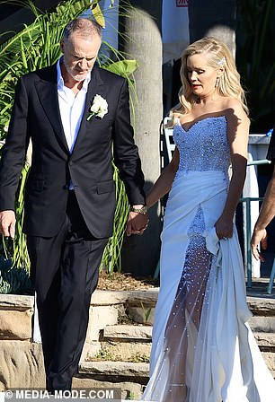 Steve also looked dapper for his big day in a black tuxedo, white button-down shirt, and dress shoes.