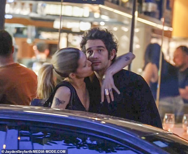 The model and actress, who is in Australia to film the remake of I Know What You Did Last Summer, then leaned back and kissed the side of her cheek as Matt beamed from ear to ear.