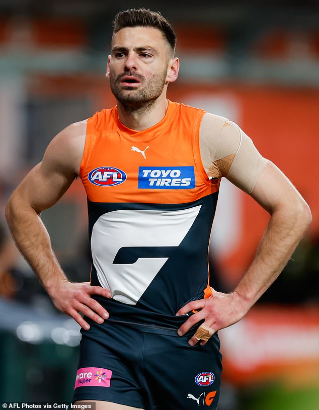 In the photo of Coniglio leaving the field after the blow that left him with five fractures in his face