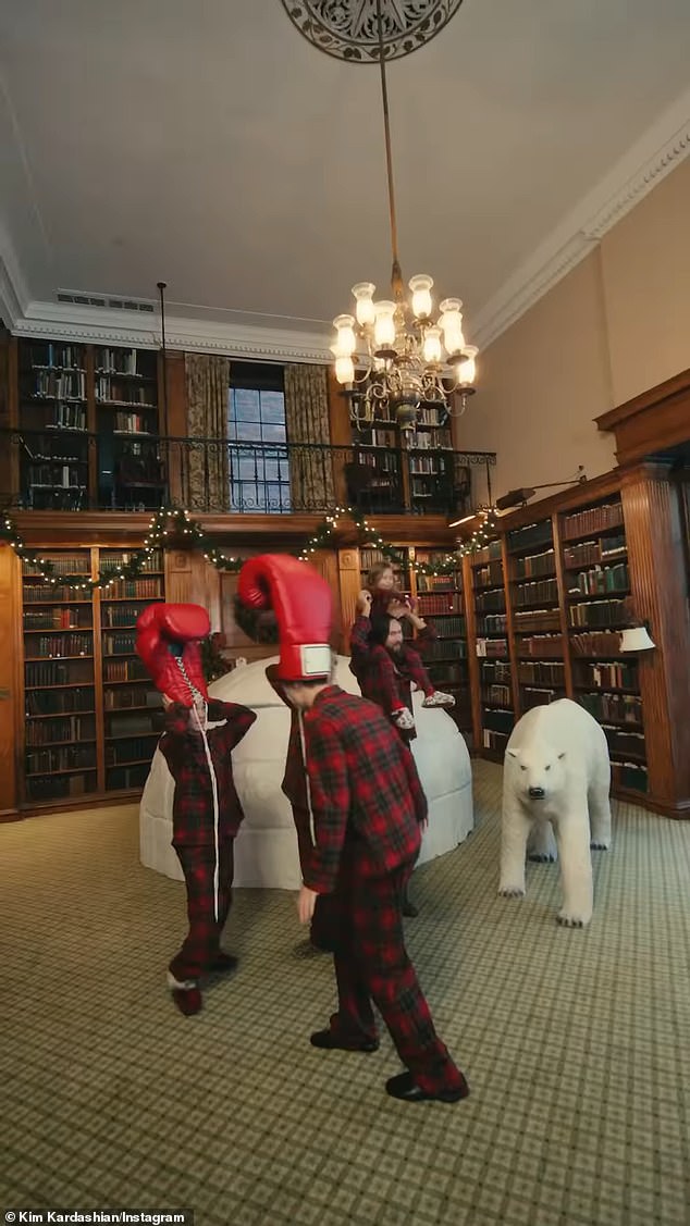 The children receive expensive gifts that they play with inside the mansion's personal library.