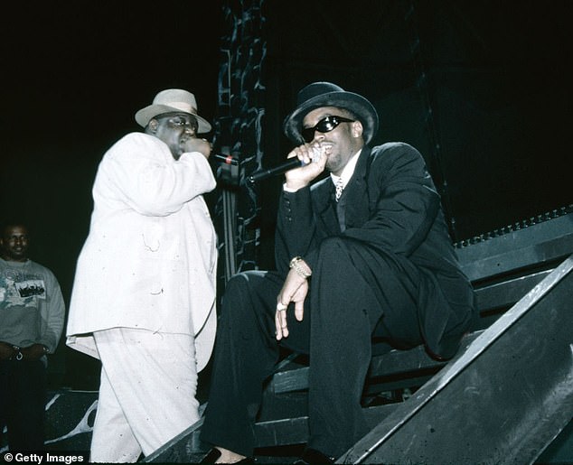 Biggie (left) and Diddy (right) perform at the Chicago International Amphitheater in April 1995.