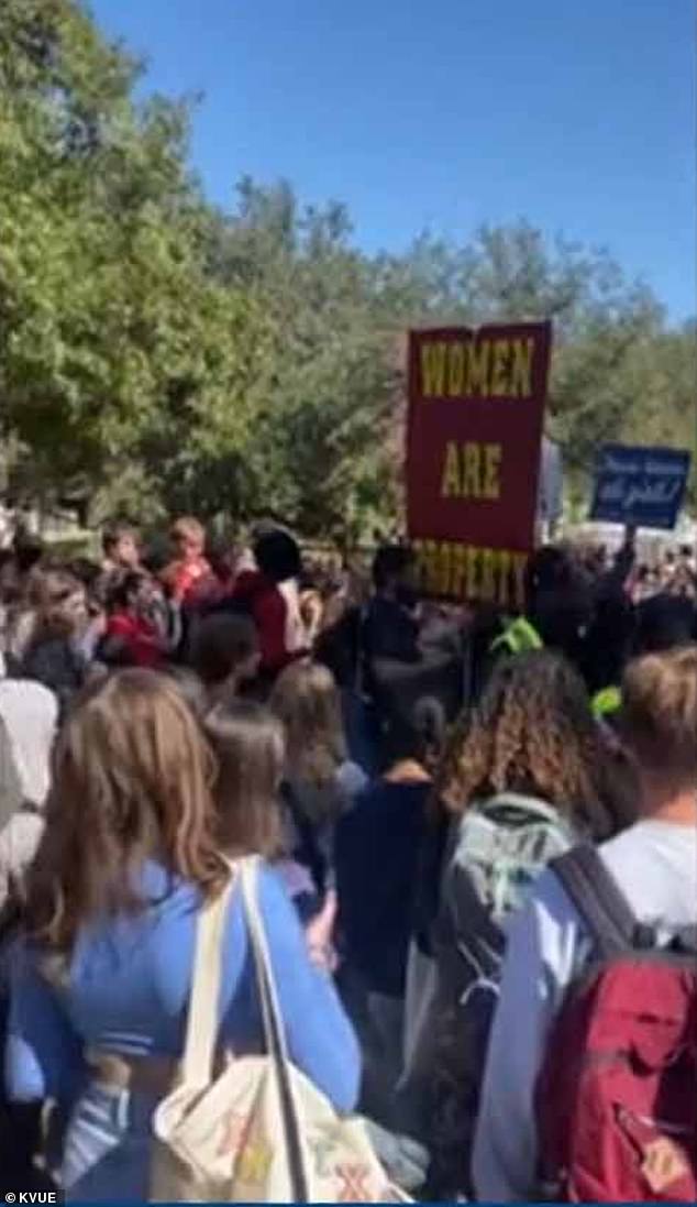 A crowd of students surrounded the unwanted protesters and some yelled at them to leave.