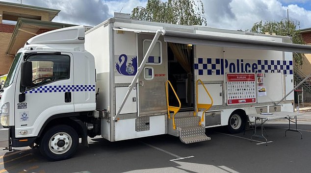 Detectives from the Cold Case Investigation Team have been tasked with solving the mystery and officers have been stationed at a mobile police facility (pictured) since Wednesday.