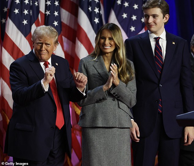 Meanwhile, the politician's youngest son, Barron, 18, stood behind his father in a suit and striped tie with an American flag pin on his lapel.