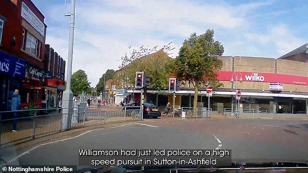 Seconds later, Williamson is seen speeding through a pedestrian crossing, narrowly avoiding a woman pushing a stroller.