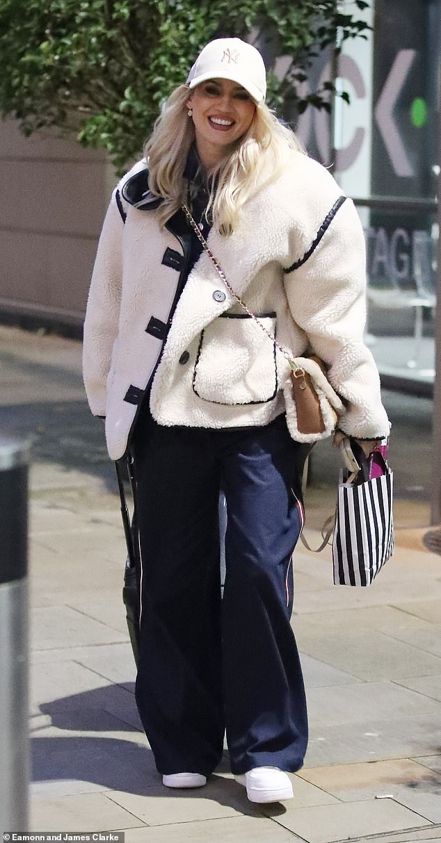 Kimberly Wyatt wrapped in a cozy shearling jacket and wide-leg pants