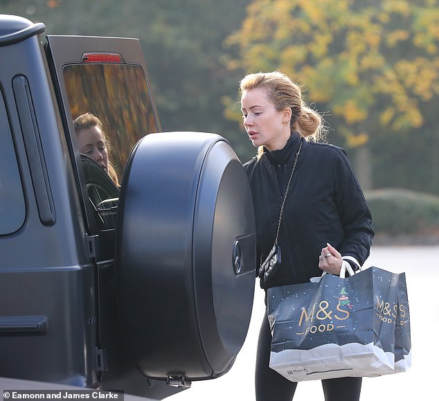 The TV personality, 33, opted for a low-key look as she took her £127,000 G-wagon for a spin.