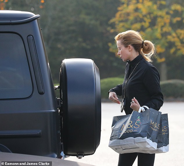 The former Love Islander was seen leaving the supermarket and packing her belongings into her stylish car.