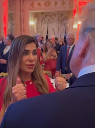 Trump paused as he made his way through the Mar-a-Lago crowd on election night to greet Flicker.