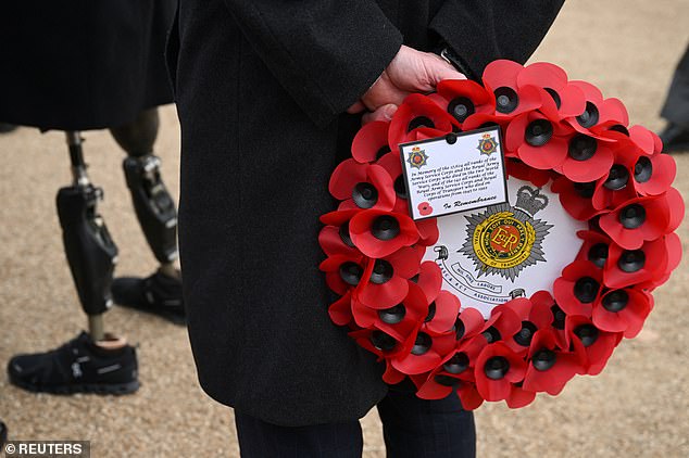 Poppy wreaths have been worn for the Royal British Legions march past the Cenotaph.