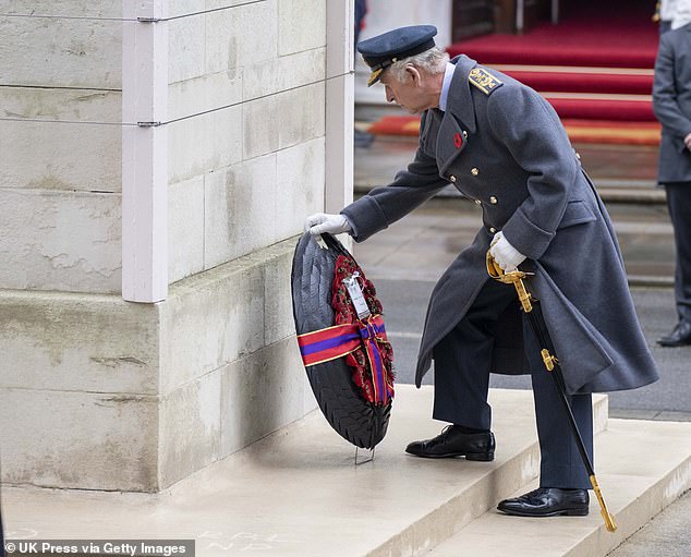 The King, who is expected to take part in today's National Remembrance Service, is seen laying a wreath at the Cenotaph in central London on November 12 last year.