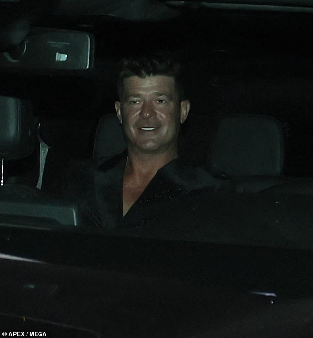 Meanwhile, Robin Thicke, 47, looked in high spirits as he arrived at the event.