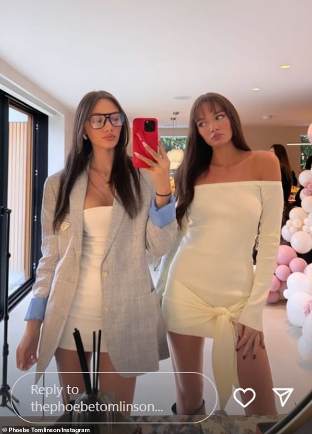 Lottie's younger twin sisters, Phoebe and Daisy, also posed for a mirror selfie in coordinating white minidresses.