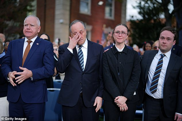 Running mate Tim Walz, husband Doug Emhoff and stepchildren Ella and Cole Emhoff were overcome with emotion at times during the speech.