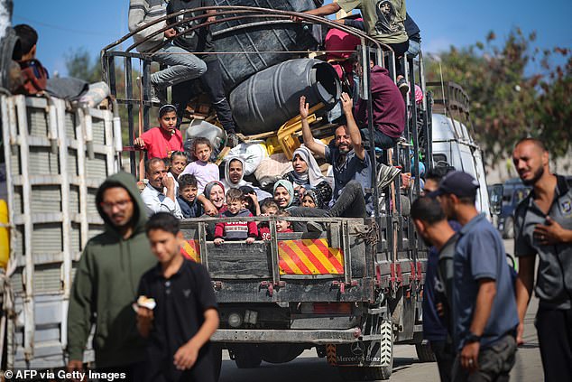 Displaced Palestinians flee Rafah with their belongings to safer areas in the southern Gaza Strip