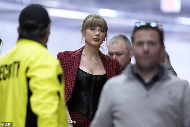 A crowd gathered as Swift entered the stadium after flying in from New York.