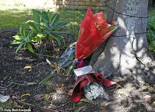 The tragic death of mother-of-two Emma Lovell in her own home shocked the North Lakes community. The photo shows tributes at the site.