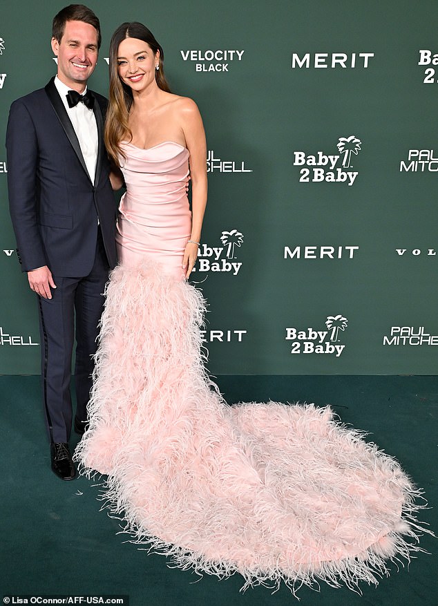 The event took place just nine months after Miranda gave birth to Pierre, the third child she shares with husband Evan Spiegel (left) and her fourth child overall.