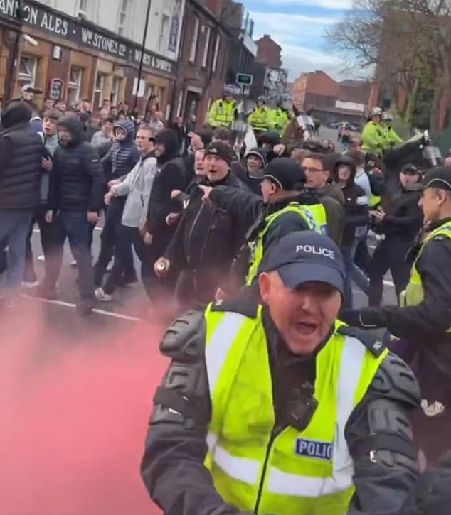 Police officers were forced to intervene to separate the two groups of rival fans on Bramall Lane.