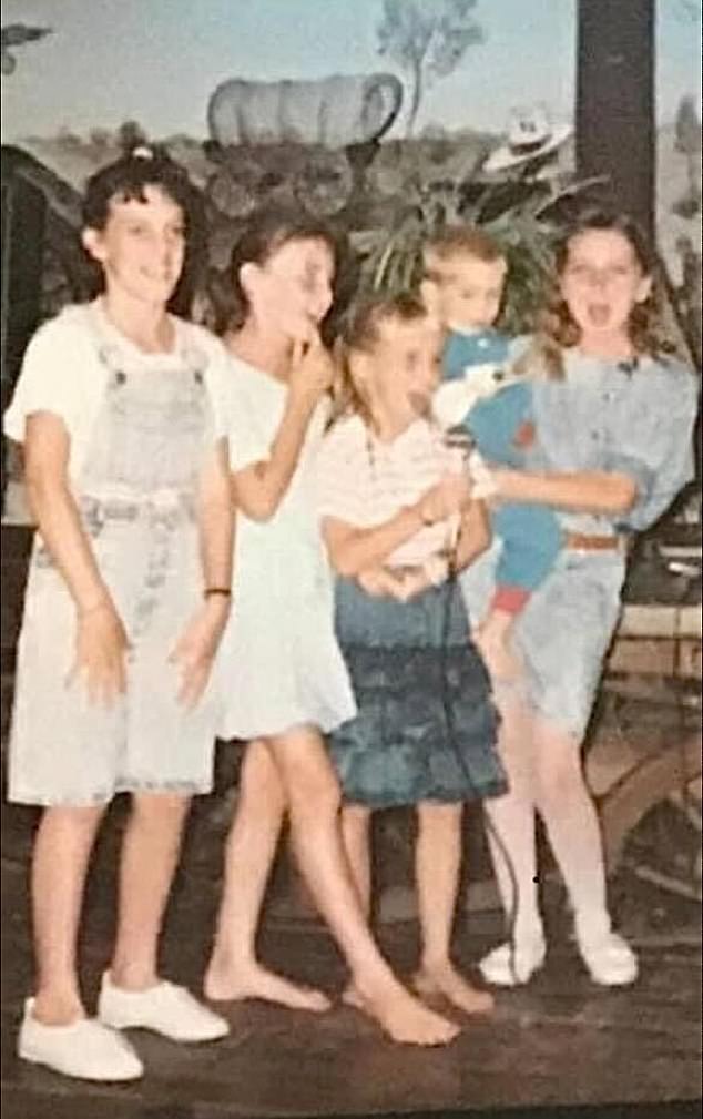 Harmony (holding microphone) and her cousin Tammy (right) were very close growing up.