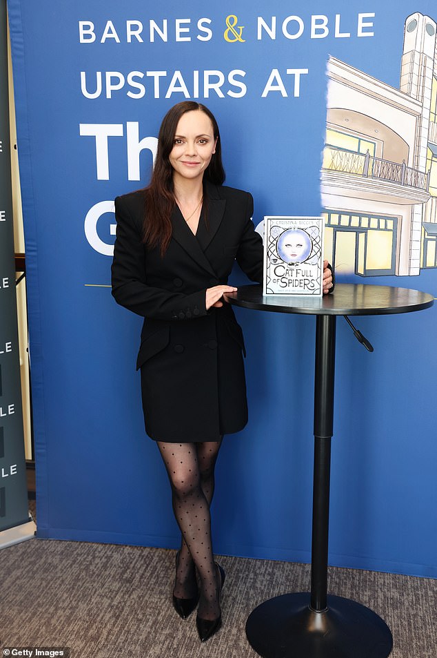 For the event, the 44-year-old Santa Monica, California, native showed off her business-chic style in a black double-breasted blazer dress, matching pumps, and her hair down.