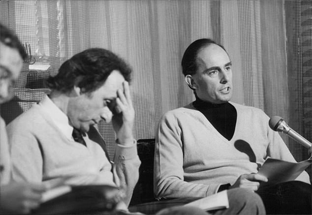 May's then-husband Stephen May (right) at a press conference in Sarmano, Italy.