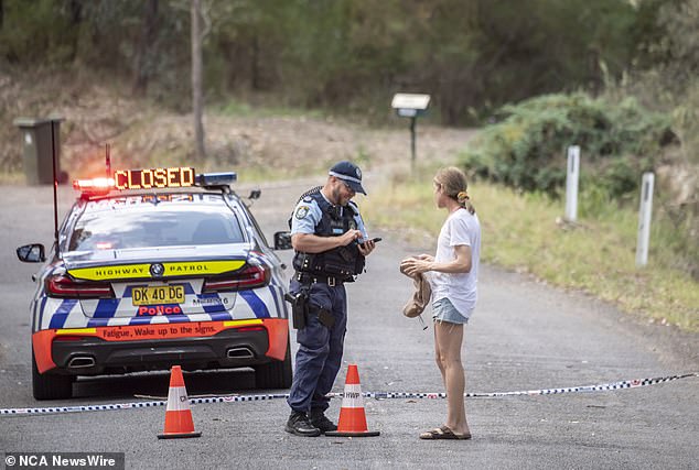 Police are shown talking to people at the campground Saturday as they investigated the incident.