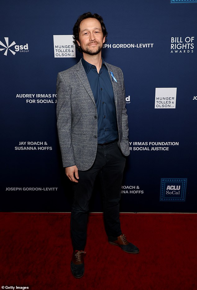 Also making a splash was Joseph Gordon-Levitt, who dressed more casually in a charcoal sports jacket, a midnight blue shirt without a tie, dark trousers and black and brown Oxford shoes.