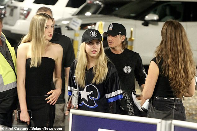 The trio, all dressed in black, were seen heading to the show after parking in a VIP garage.