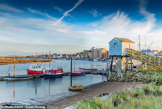 In 'picturesque' Wells-next-the-Sea (above), Ted and his family enjoy an 'excellent' seafood platter at Wells Crab House