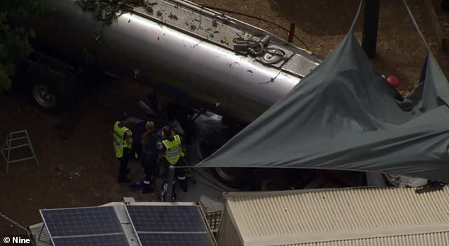 A woman has died and a child has been seriously injured after a water tanker crashed into a daycare center northwest of Melbourne.