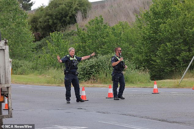 Police blocked roads surrounding the school after power lines were downed in the accident.