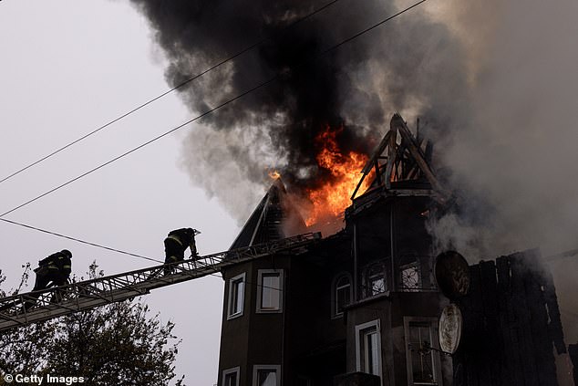 Ukrainian firefighters respond to an artillery attack on November 10, 2024 in Pokrovsk, Ukraine.