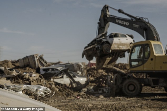 The stacks held up to six vehicles each, and the bottom cars were often the most severely damaged.