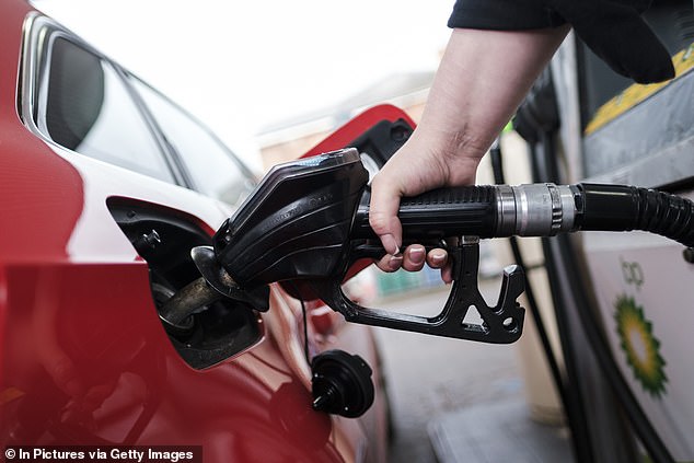 In 2022, Volkswagen agreed to pay £193 million to more than 90,000 UK drivers after the 2015 scandal (pictured is a file image of someone filling a car with diesel)