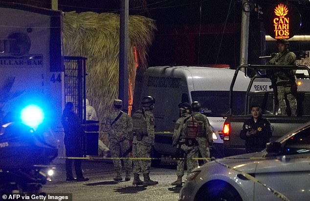 Mexican Army soldiers photographed outside Los Cantaritos bar yesterday