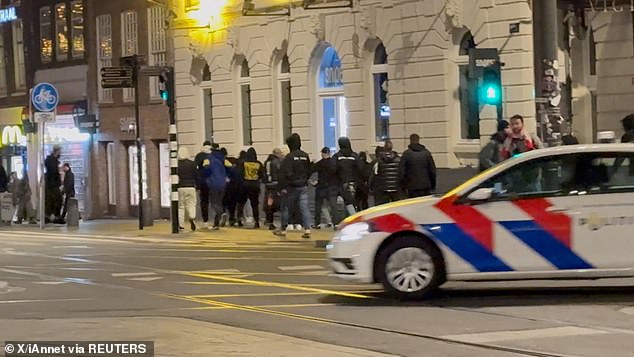 Israeli soccer fans and Dutch youth clash near Amsterdam Central Station in Amsterdam, Netherlands, on Nov. 8, 2024.