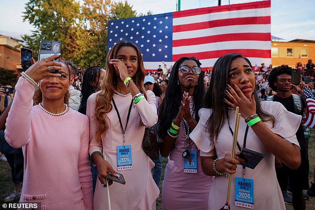 Supporters react as another takes a selfie as United States Democratic presidential candidate, United States Vice President Kamala Harris, delivers a speech acknowledging the 2024 United States presidential election.