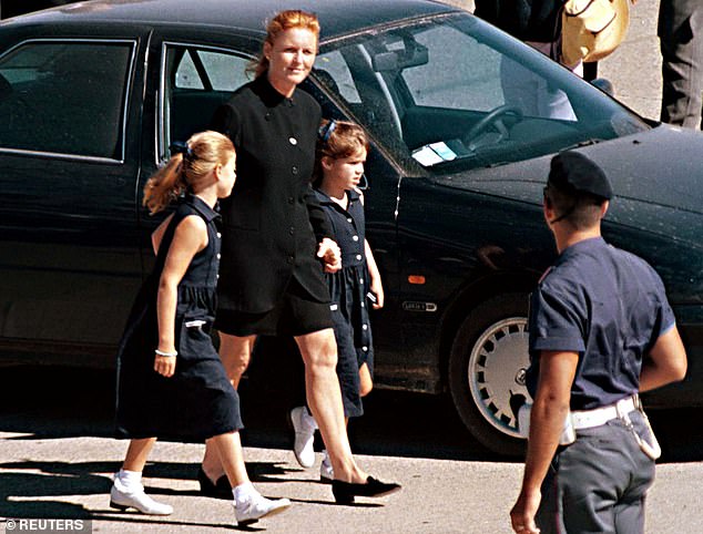 The Duchess of York, Sarah Ferguson, (2L) with her children at Pisa Airport before leaving for London in 1997