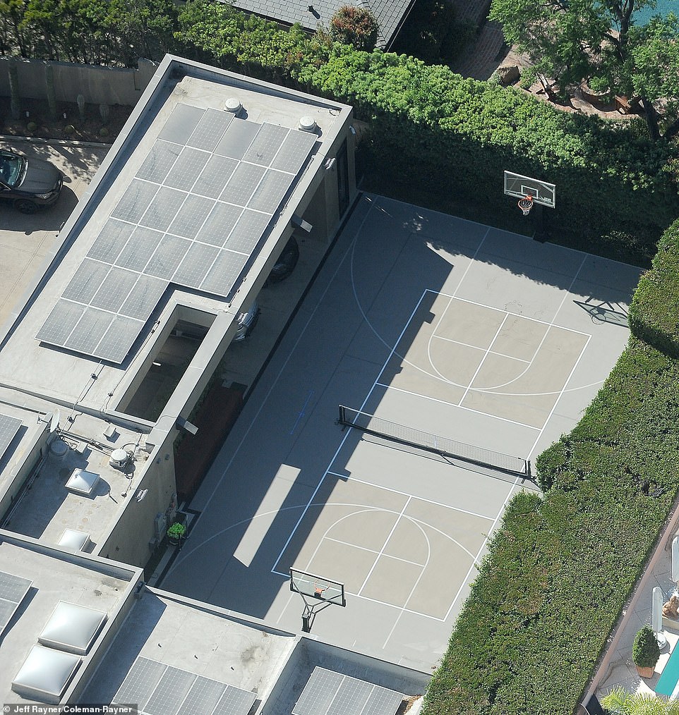 Previous property photos show that the actor has transformed his dual basketball and tennis courts from their original green color to a neutral gray.