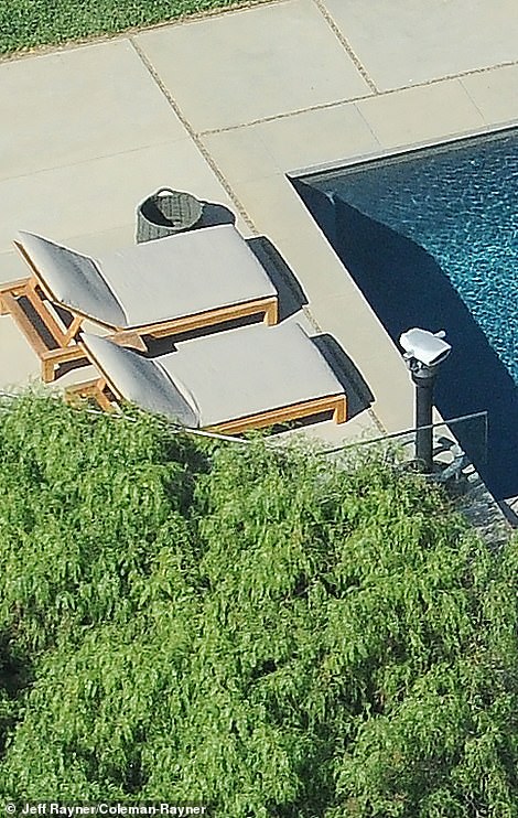 There is a large viewing telescope (right) at the edge of the deck so he and his guests can enjoy views of the city and surrounding landscape.