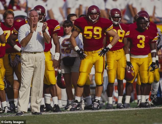 Robinson compiled a 104-35-4 record at USC and won a national championship in 1978.